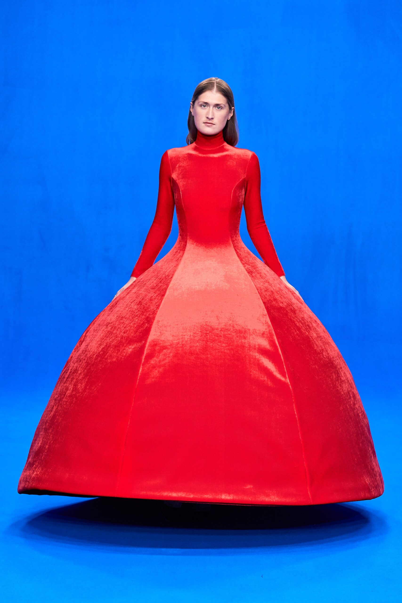 red velvet long-sleeve gown