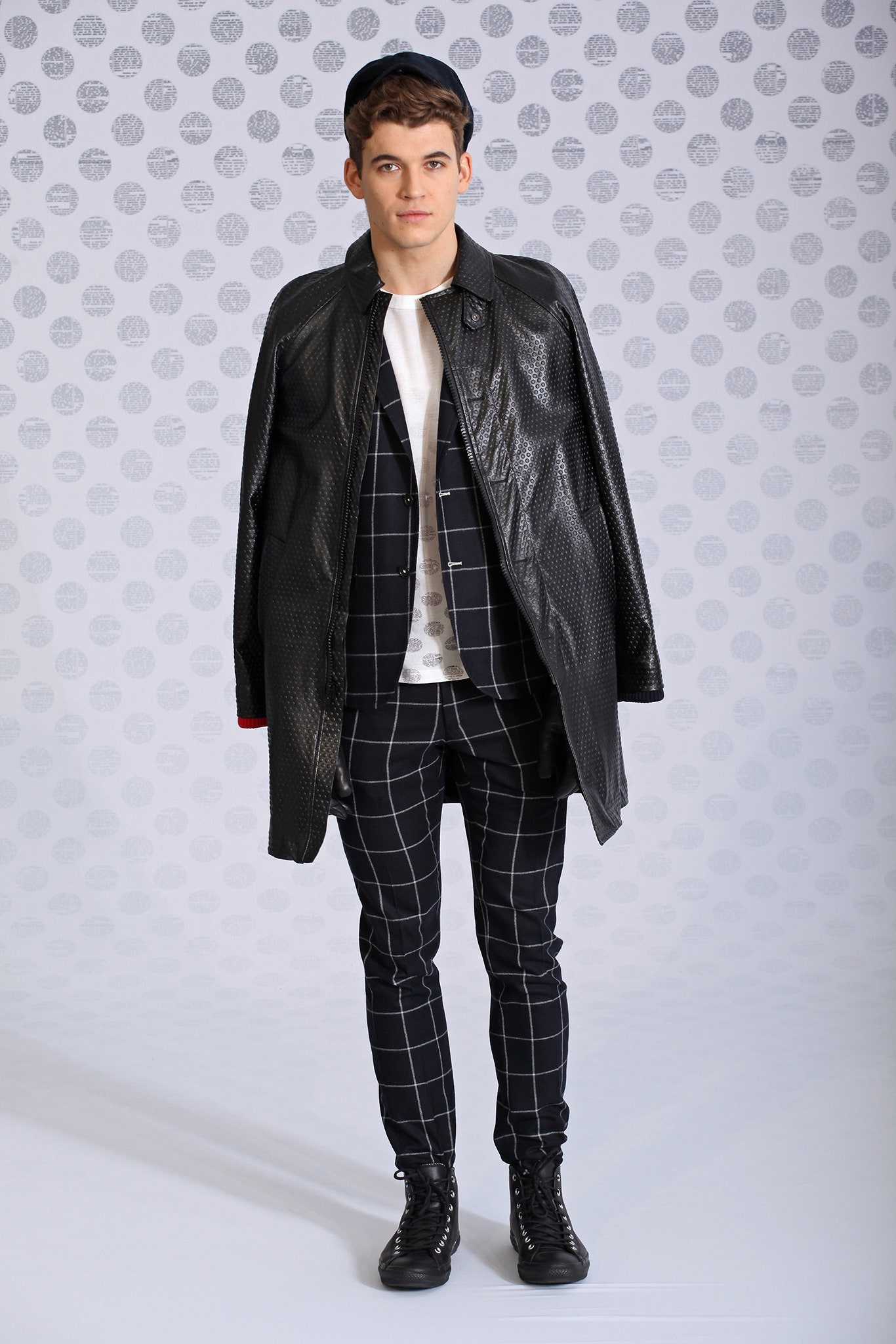 black leather long-sleeve relaxed textured coat