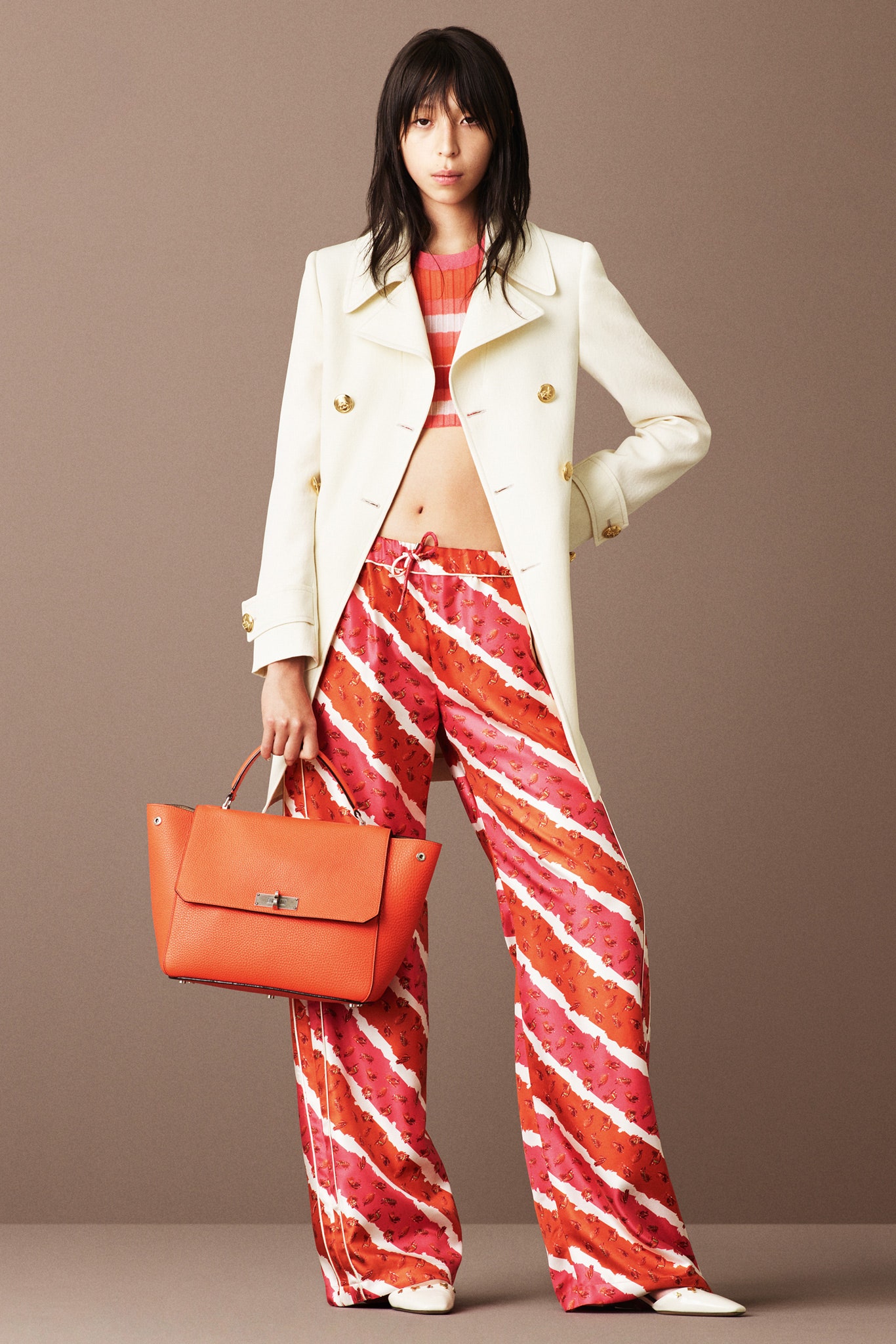 white tailored blazer with flared pants