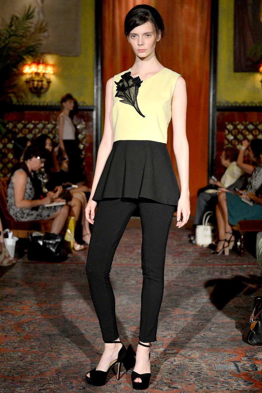 yellow and black peplum top