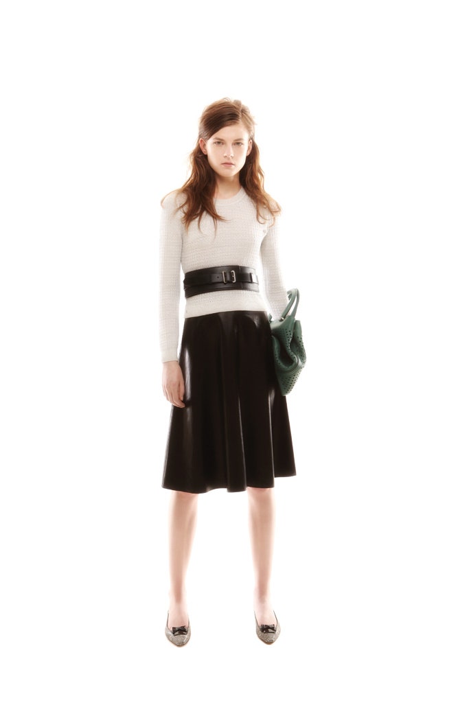 white fitted top and black midi skirt