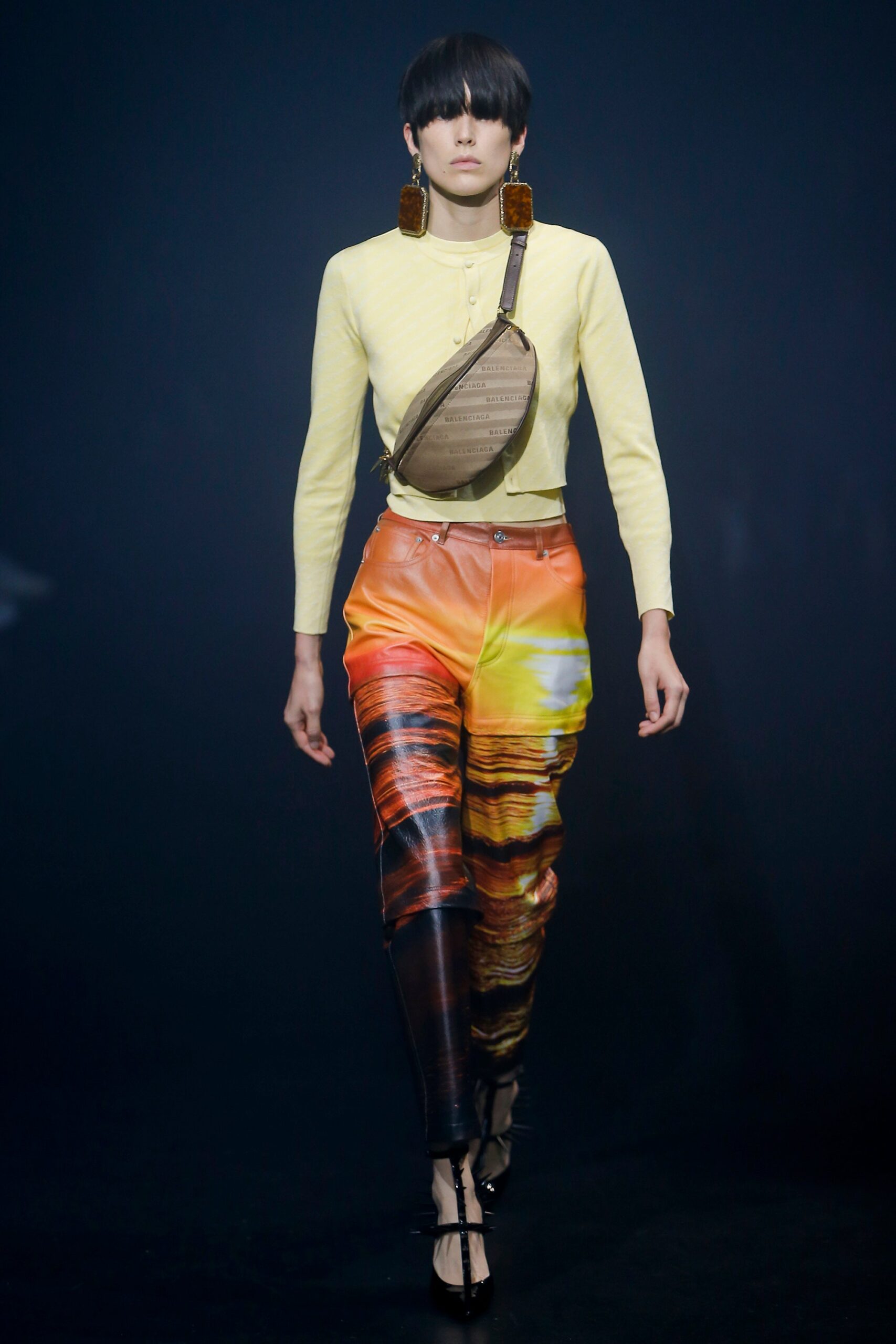 yellow fitted top with flared pants