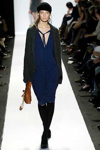 blue fitted midi dress with gray cardigan