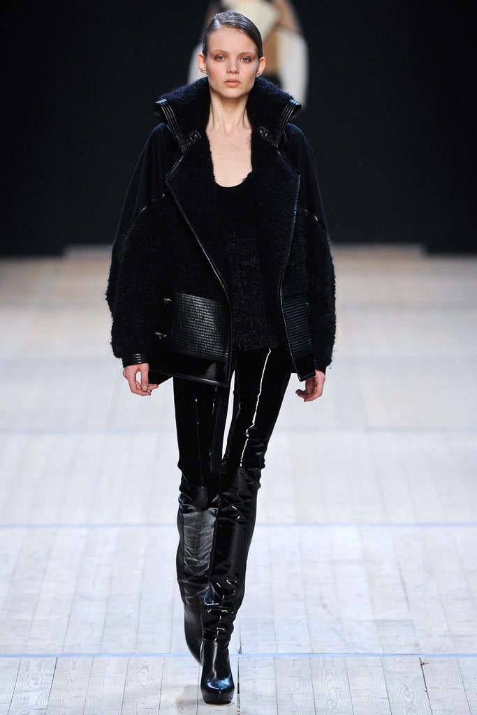 black relaxed jacket with vinyl pants