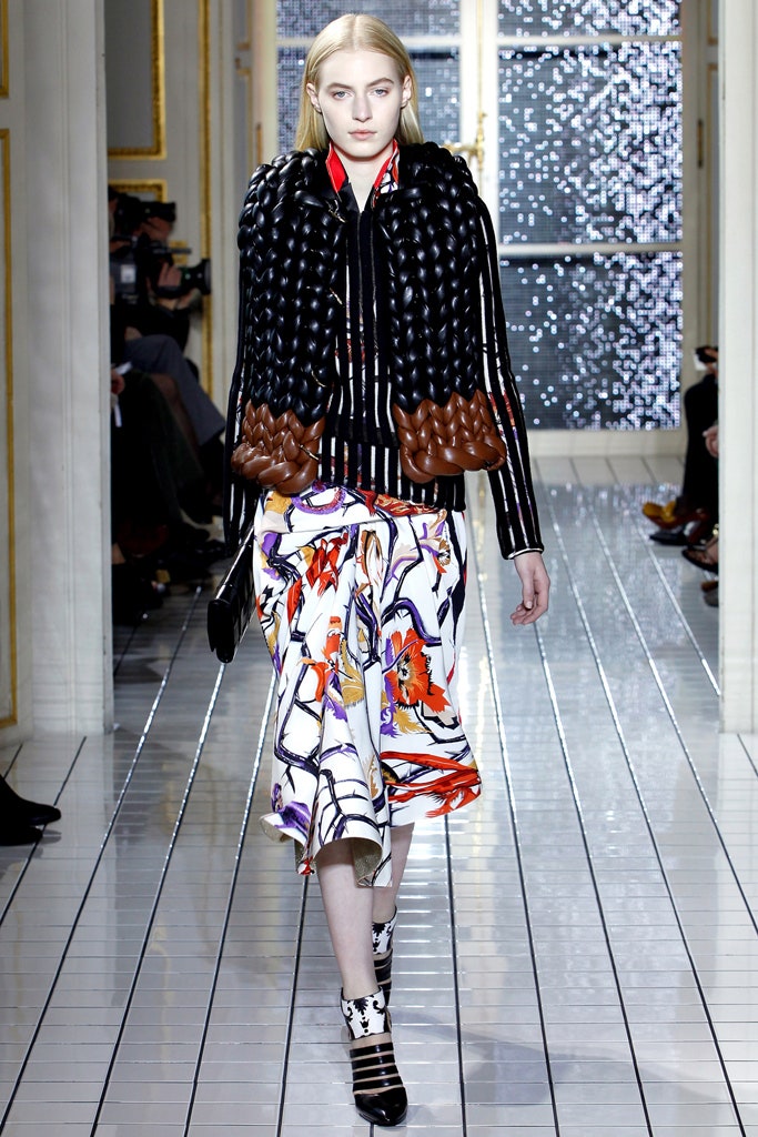 black leather padded jacket and flared skirt