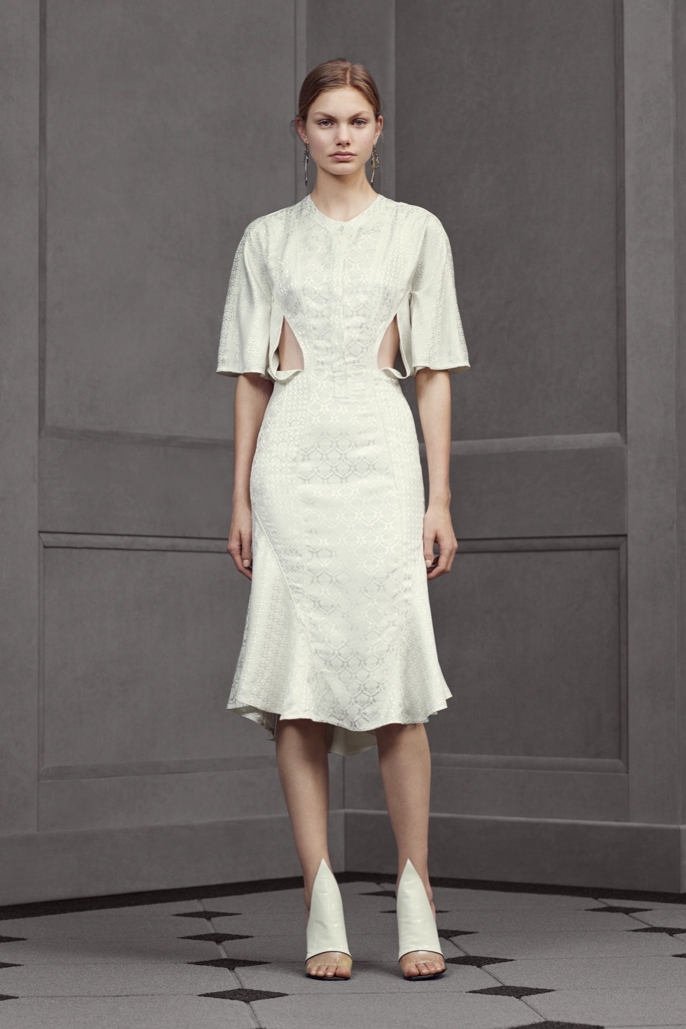 white fitted midi dress with cutouts