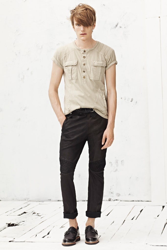 beige collared shirt with black pants