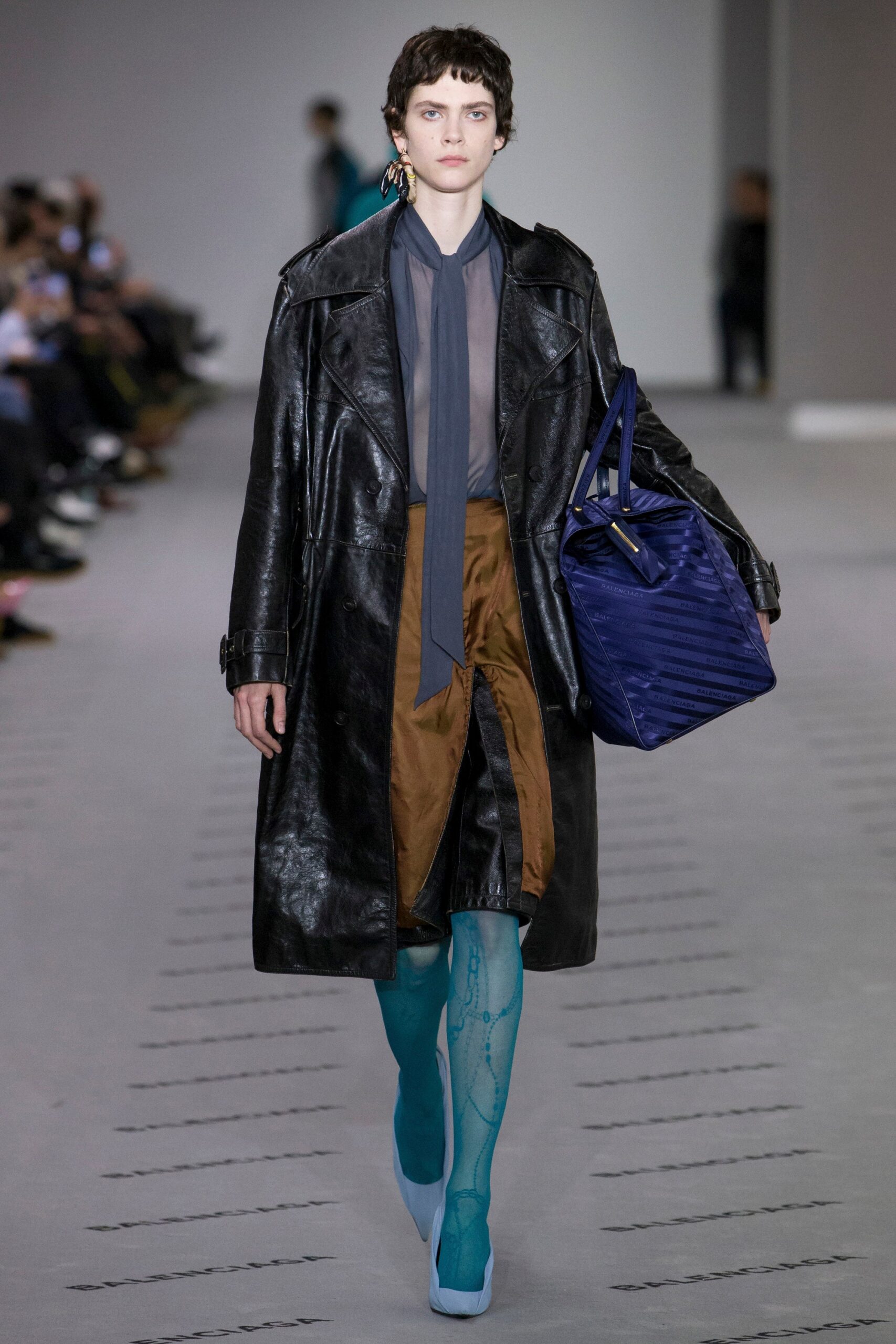 black leather coat with gray top