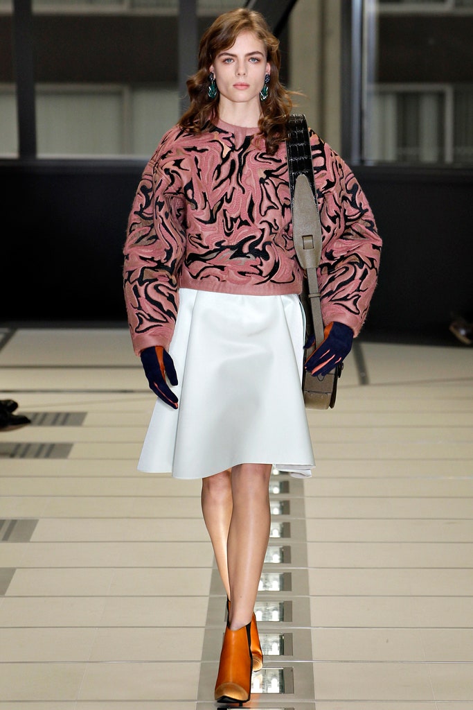 pink embroidered top with white skirt