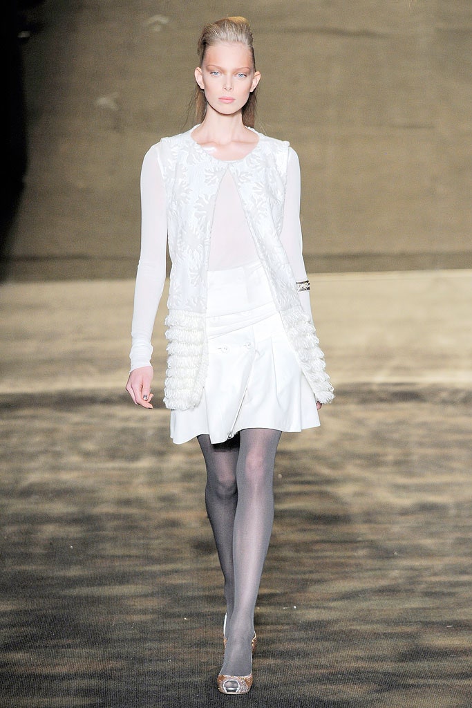 white fitted top and mini skirt