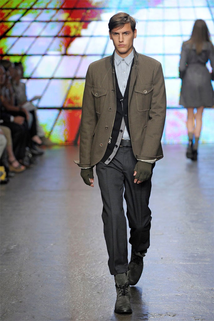 brown jacket with gray pants