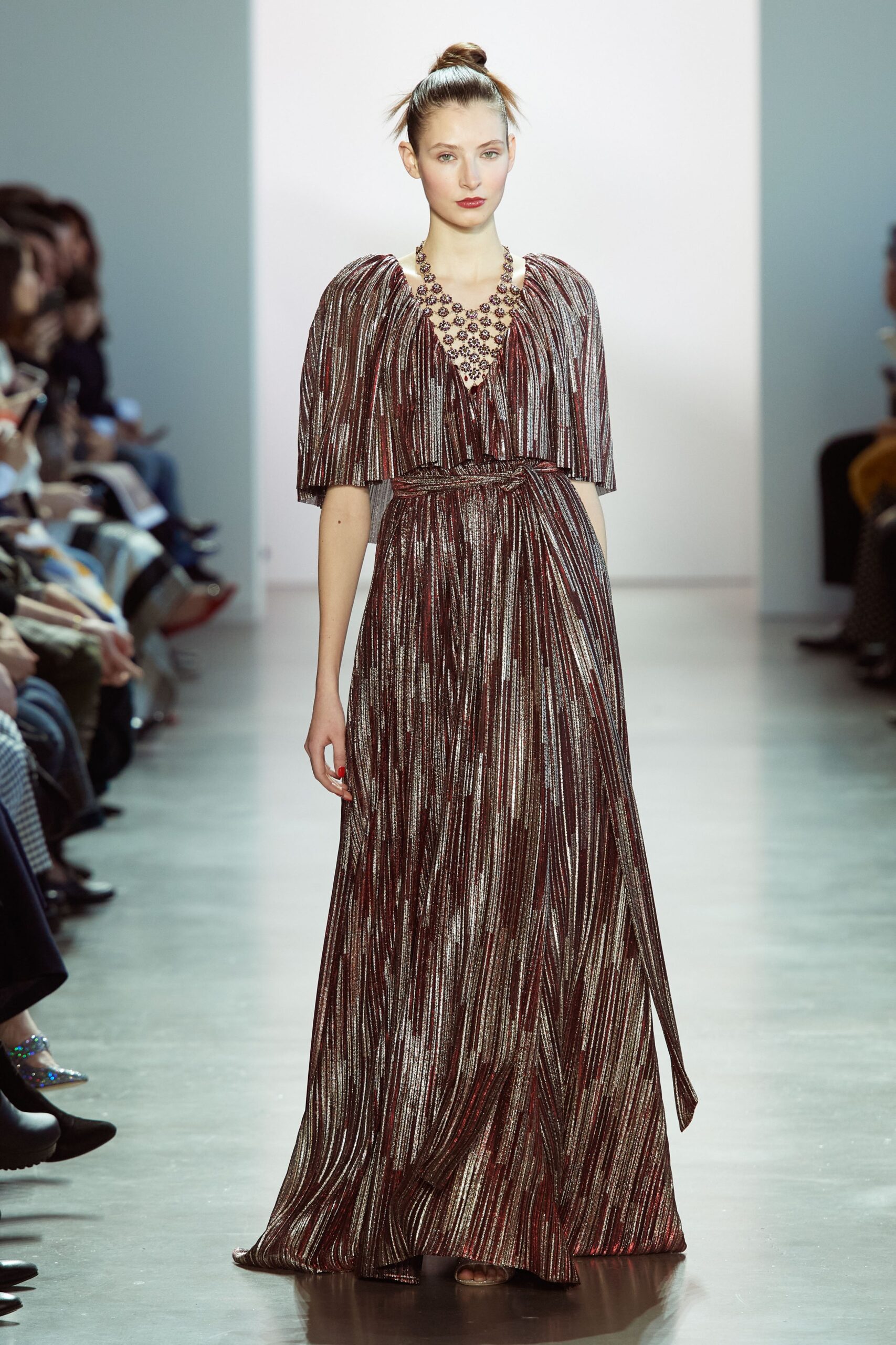 red and gold pleated gown