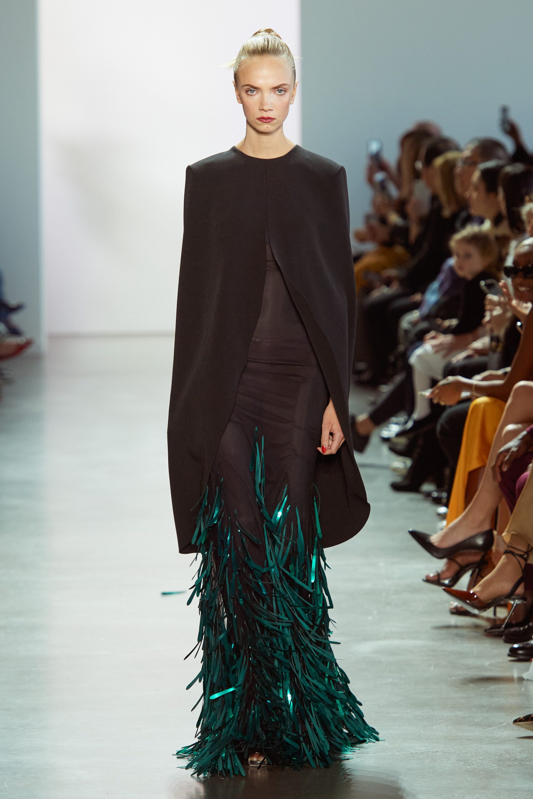 black cape and layered dress