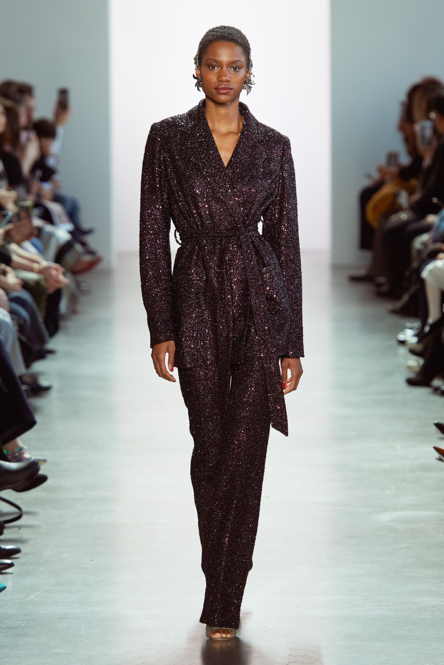 black shiny belted jumpsuit