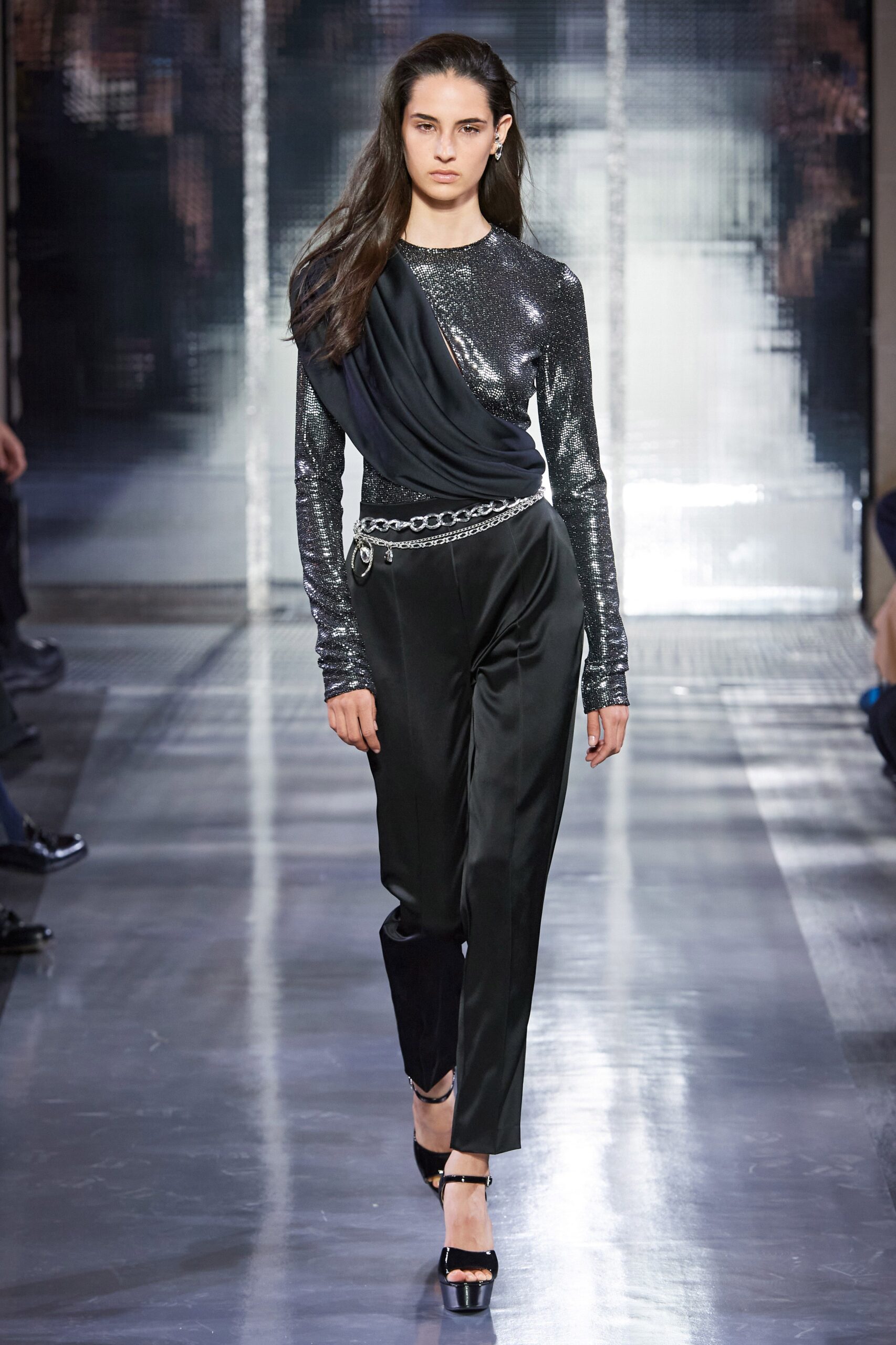 black sequined top with tailored pants