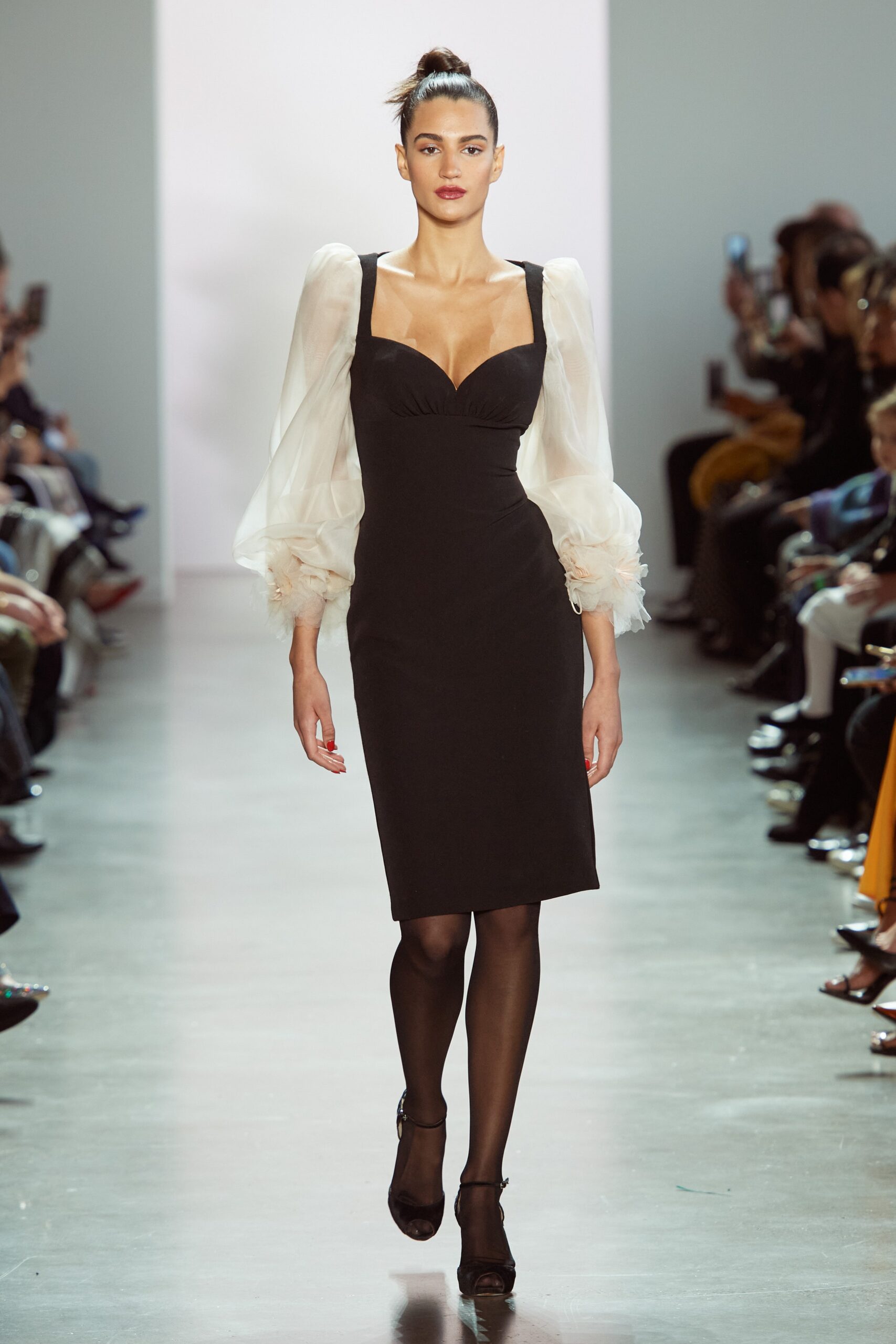 black fitted midi dress with white blouse
