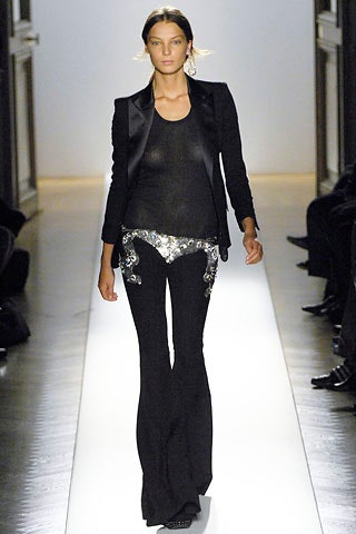 black tailored blazer with flared pants