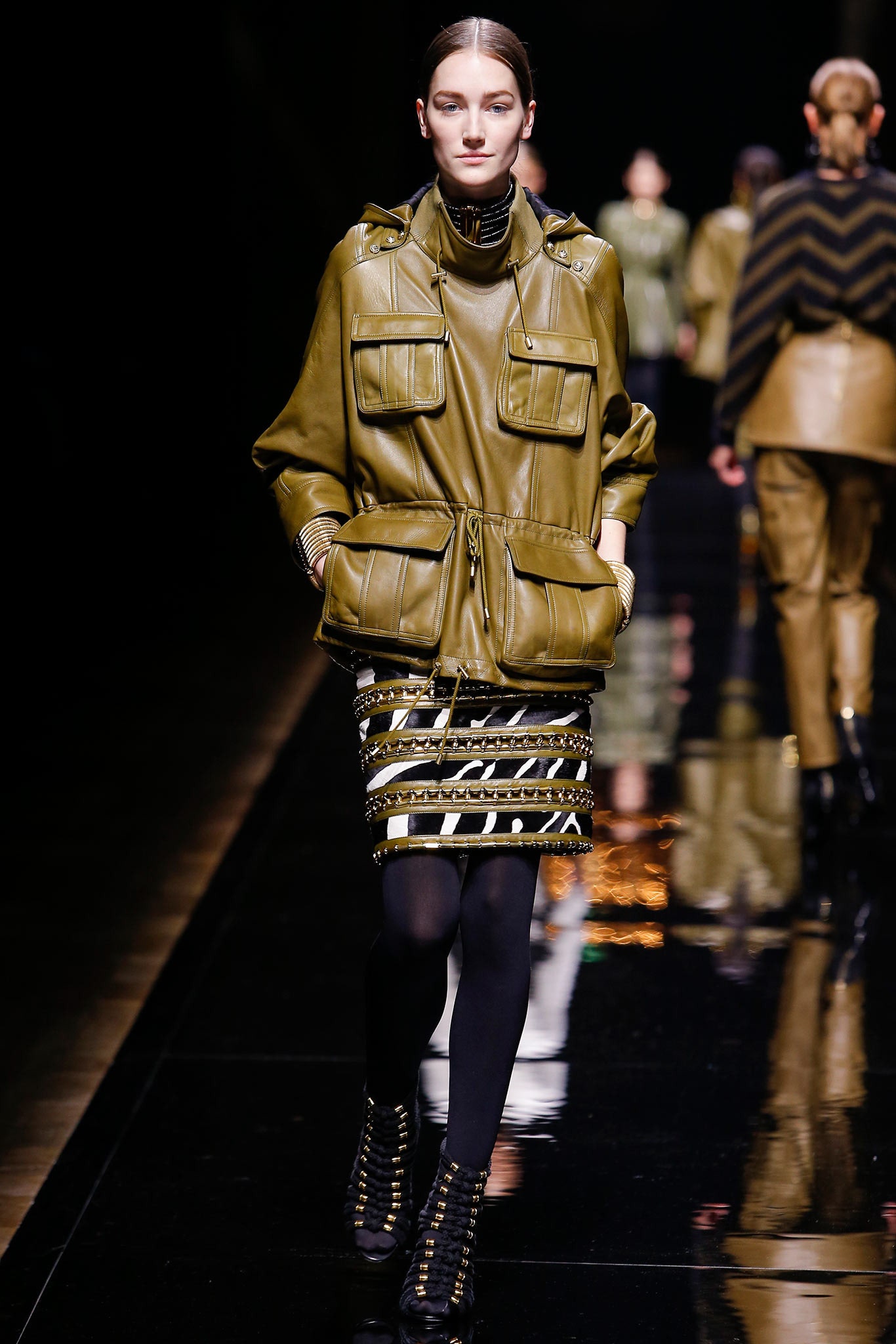 green leather jacket and black gold skirt
