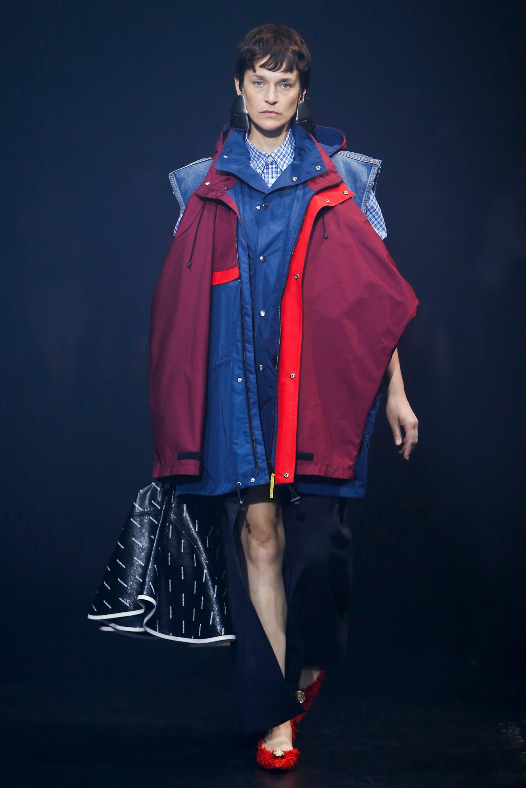 blue coat with red accents