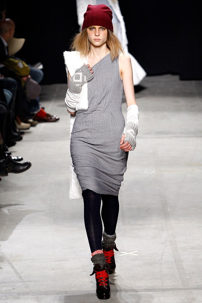 gray fitted midi dress with red hat