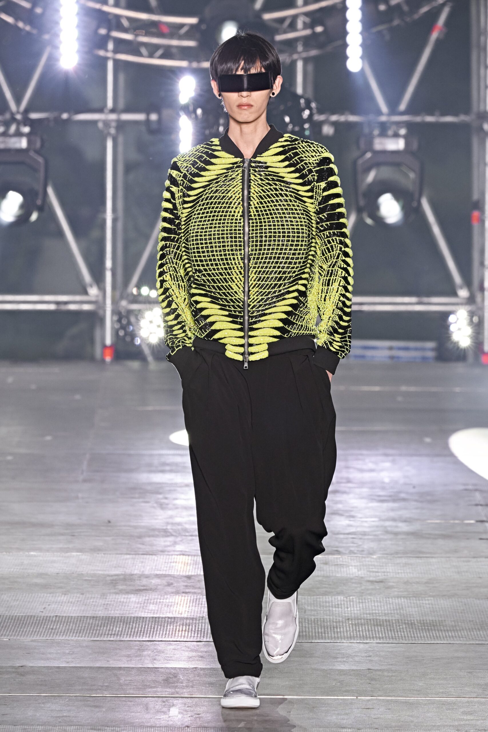 black and yellow printed jacket with relaxed pants