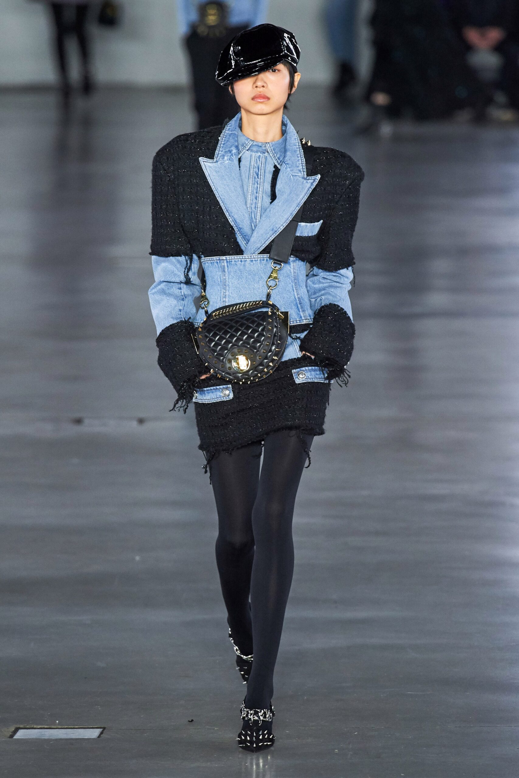 structured black denim jacket with mini skirt