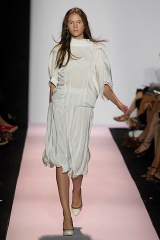 white silk relaxed top and skirt