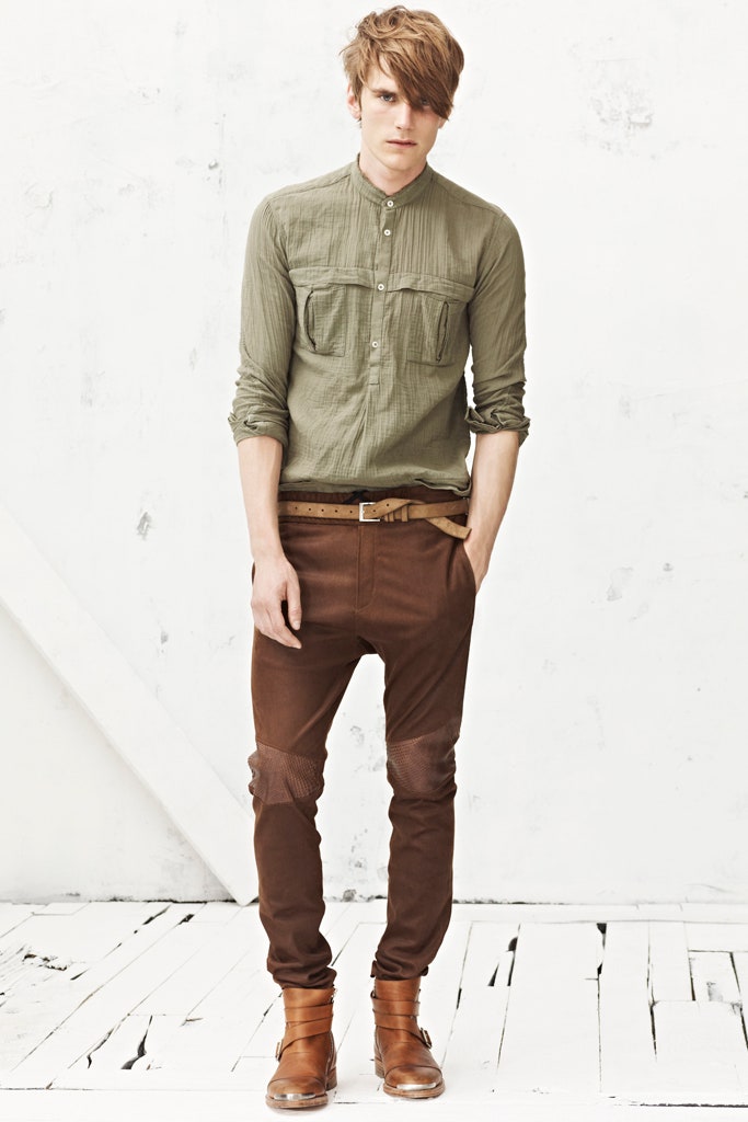 green fitted shirt with brown pants