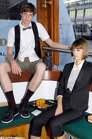 black blazer white shirt beige shorts