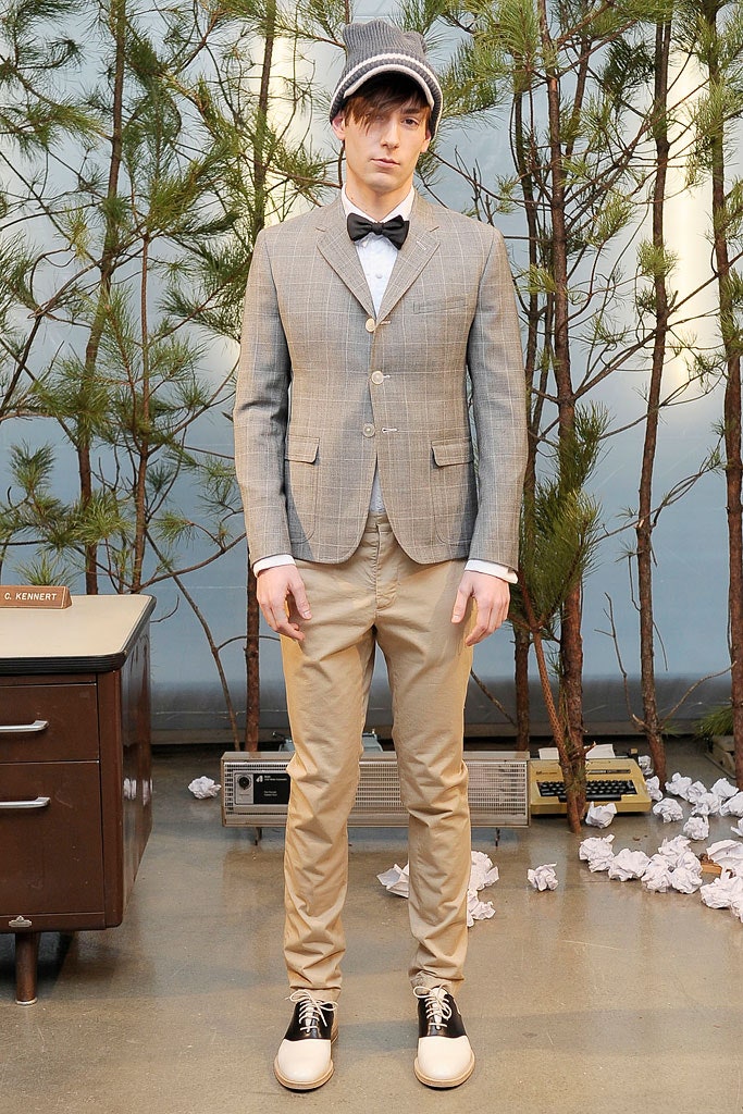 gray checked blazer with beige pants