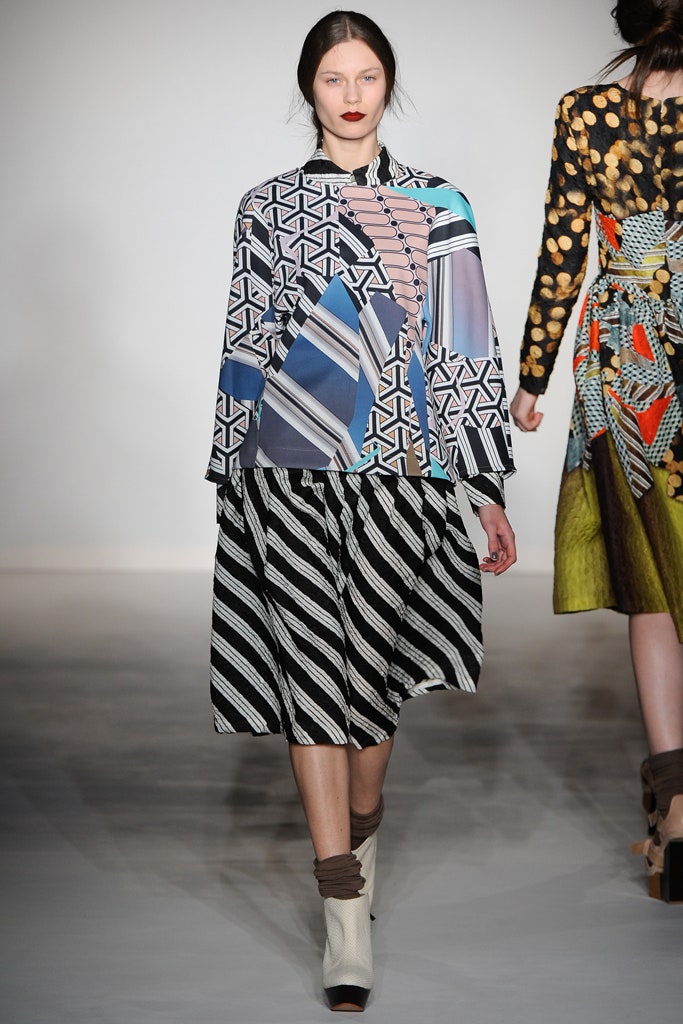 relaxed silk blouse with pleated skirt