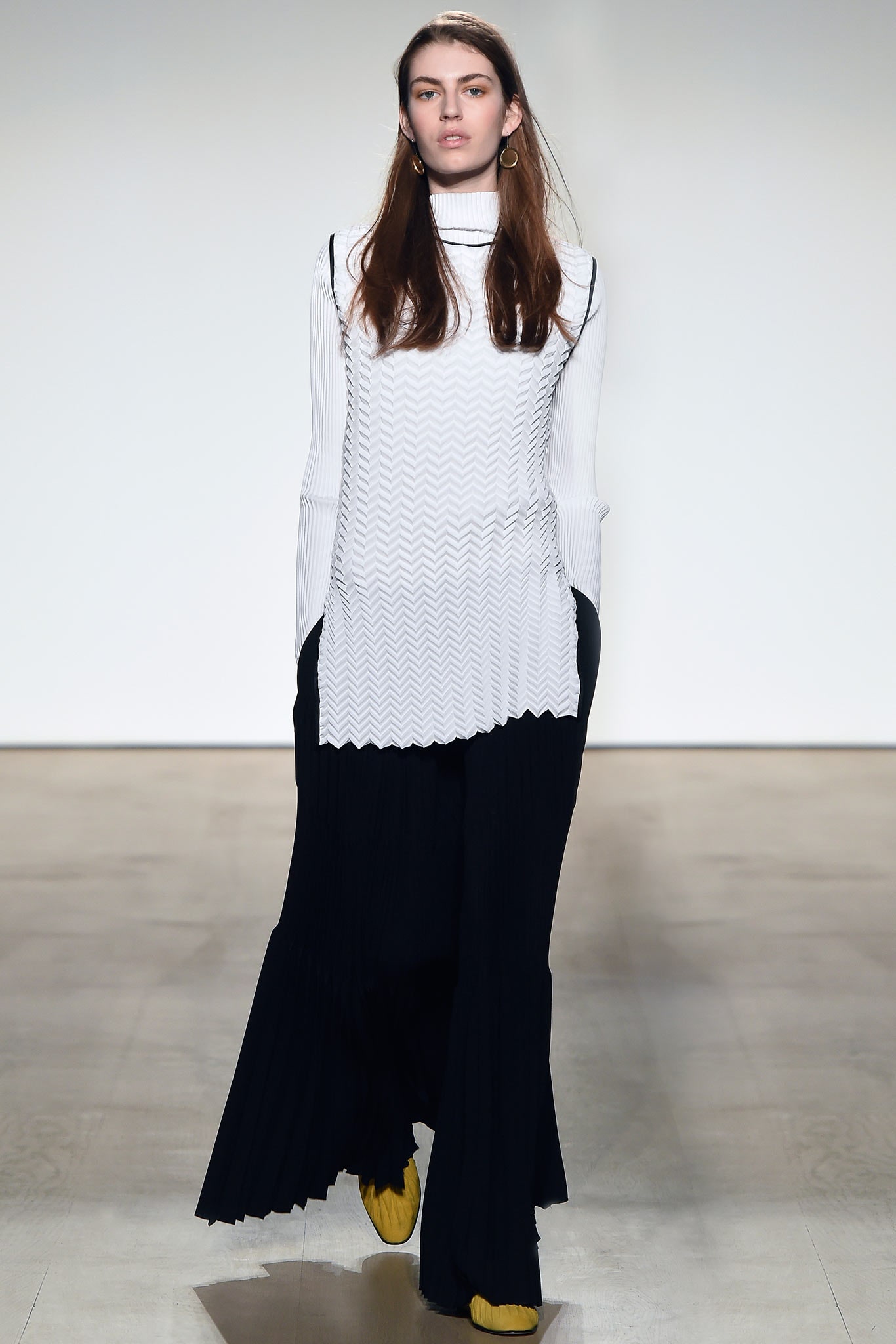 white fitted top with black pants