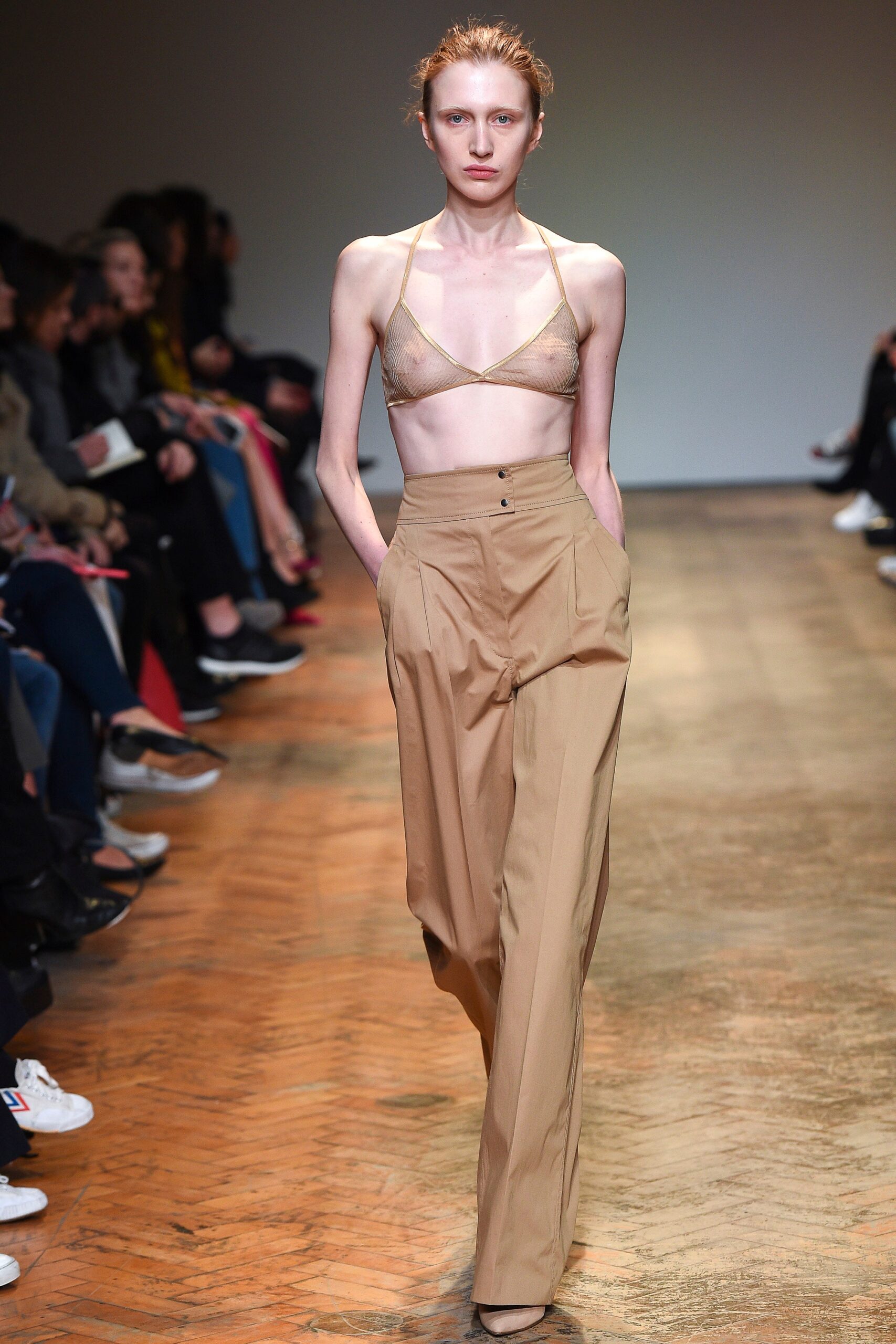 beige lace bra and relaxed pants