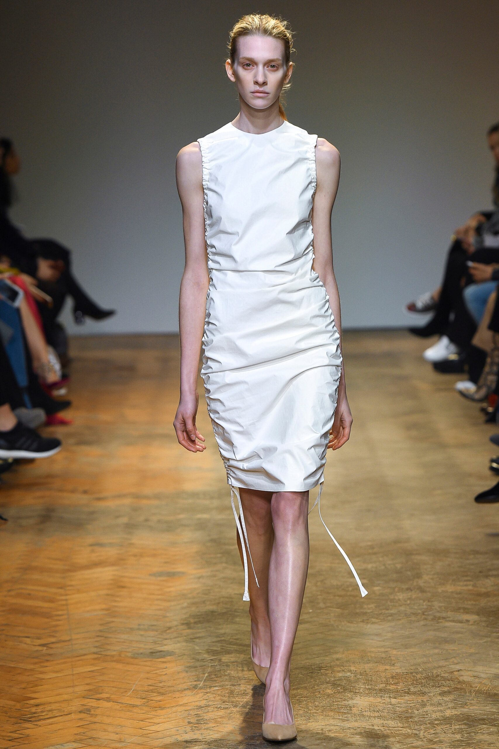 fitted white sleeveless dress
