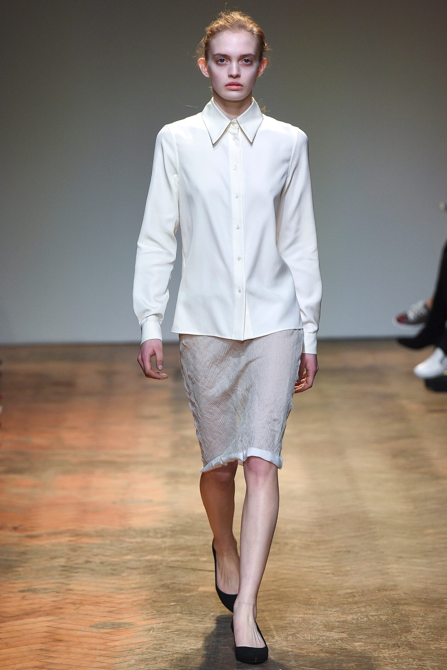 white silk fitted shirt and gray midi skirt