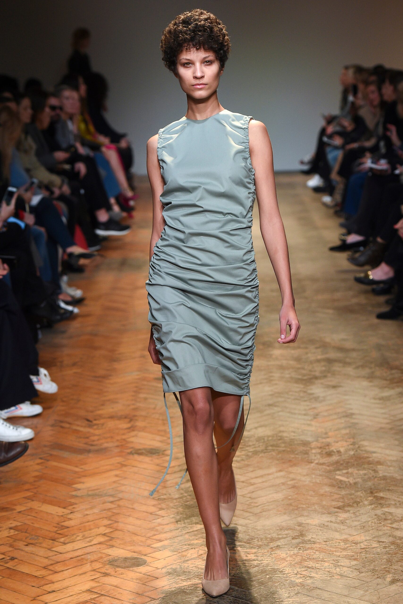 fitted green sleeveless dress