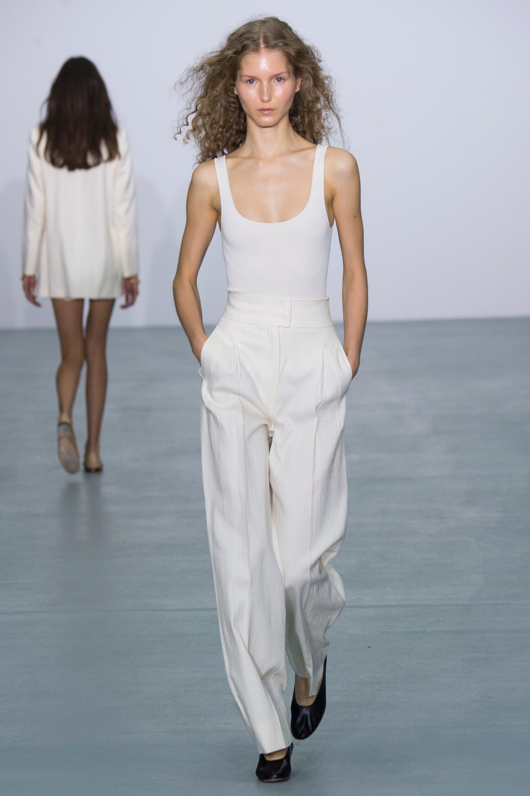 white cotton sleeveless scoop-neck fitted bodysuit