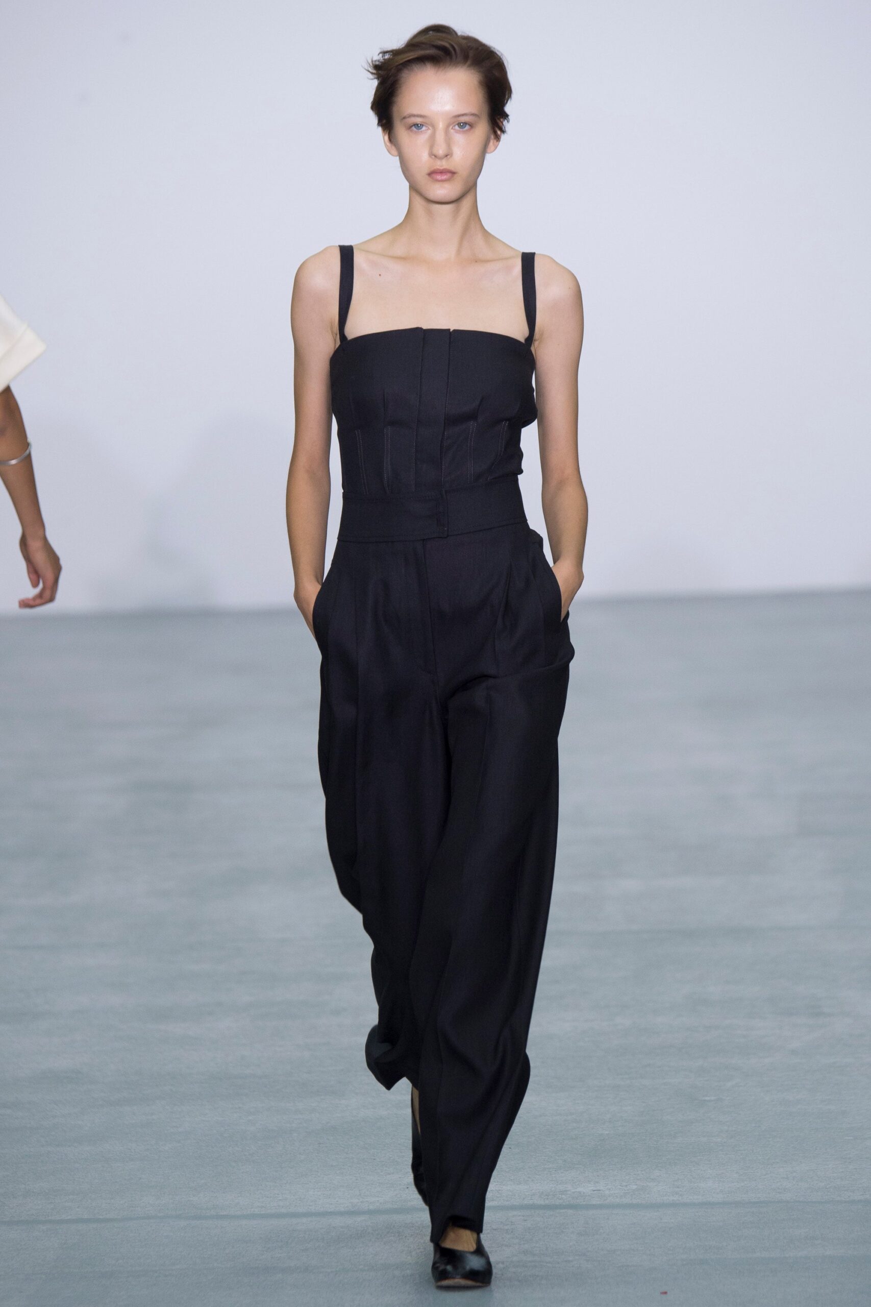 black fitted sleeveless jumpsuit