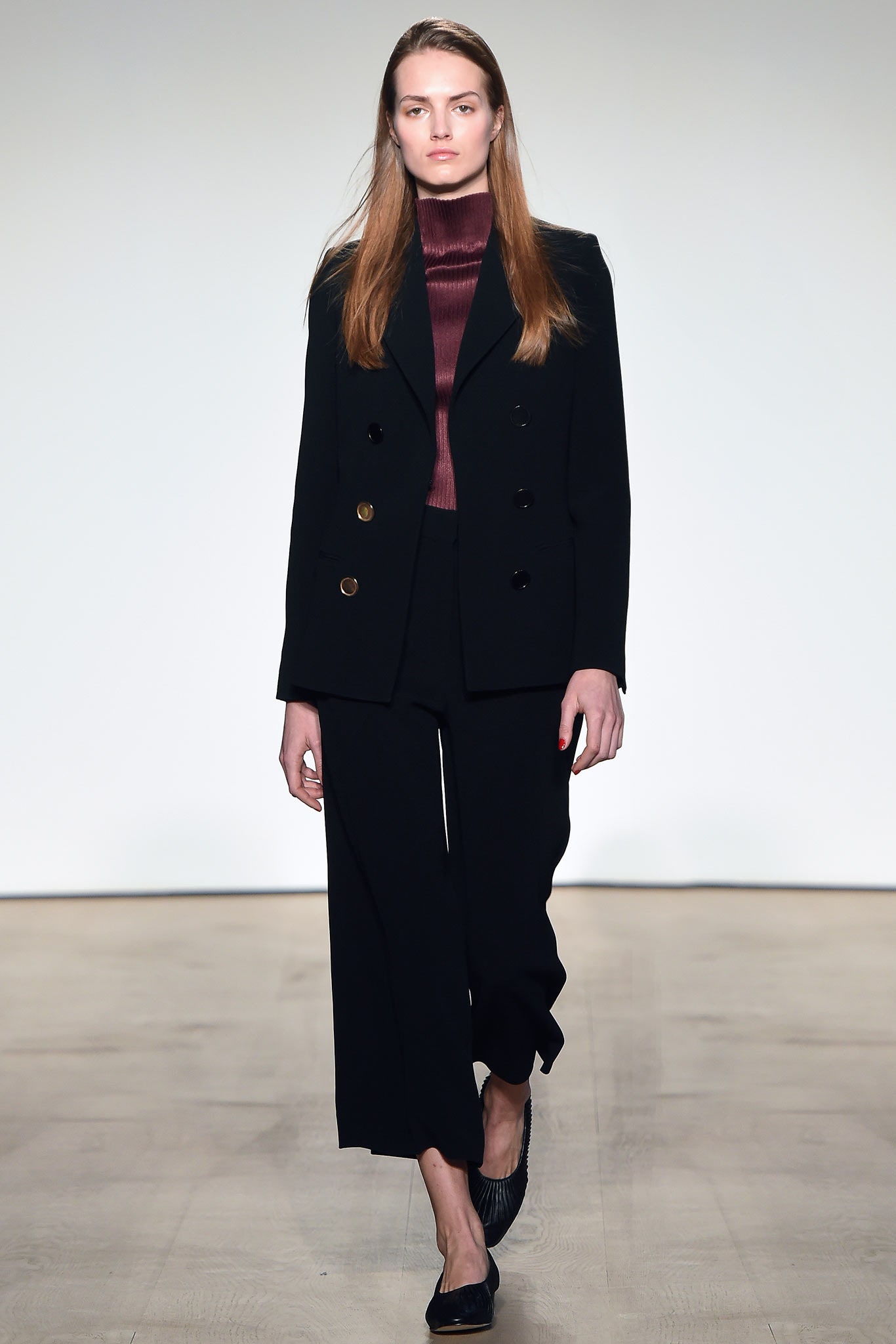 black tailored blazer with red top