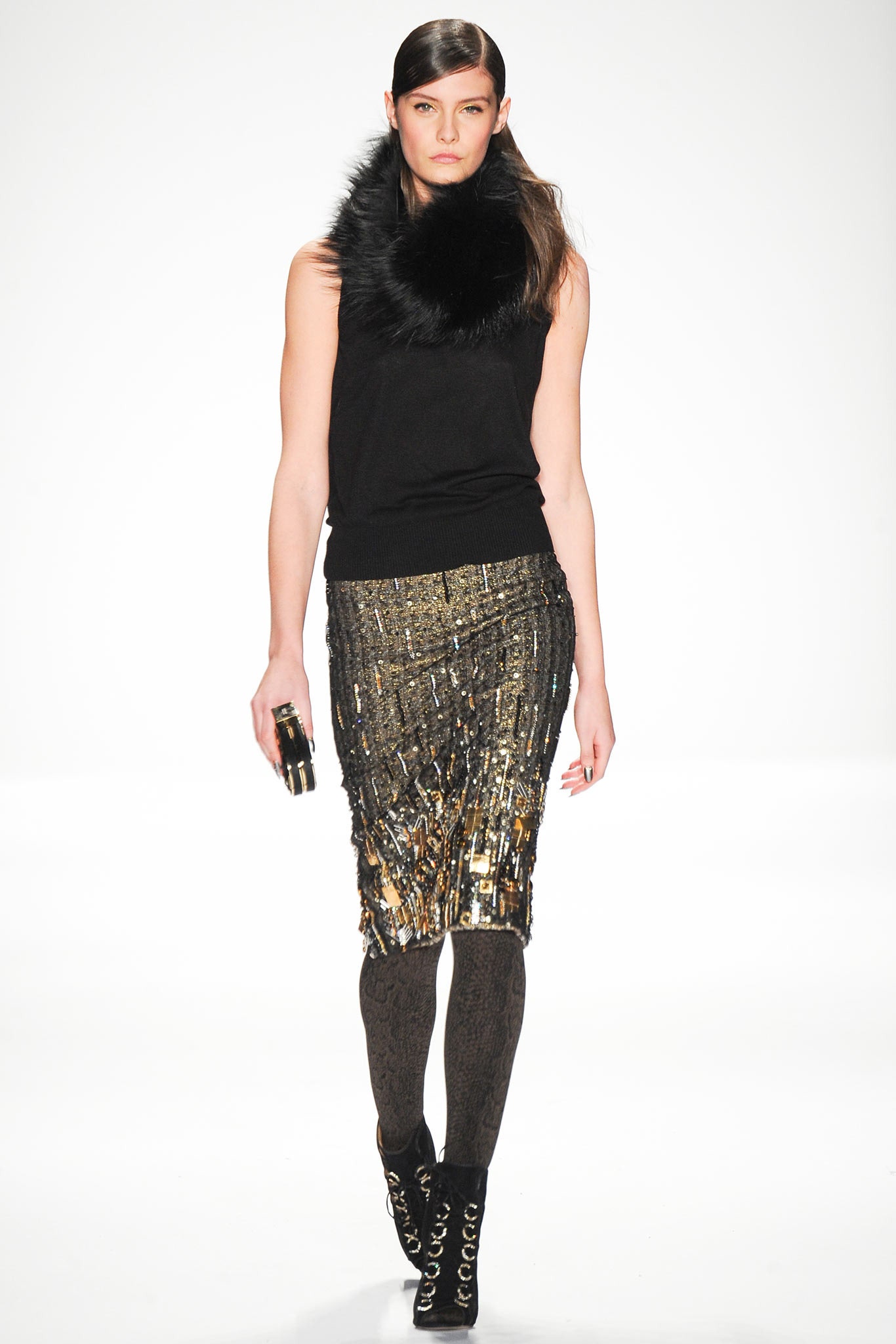black fitted top with gold skirt