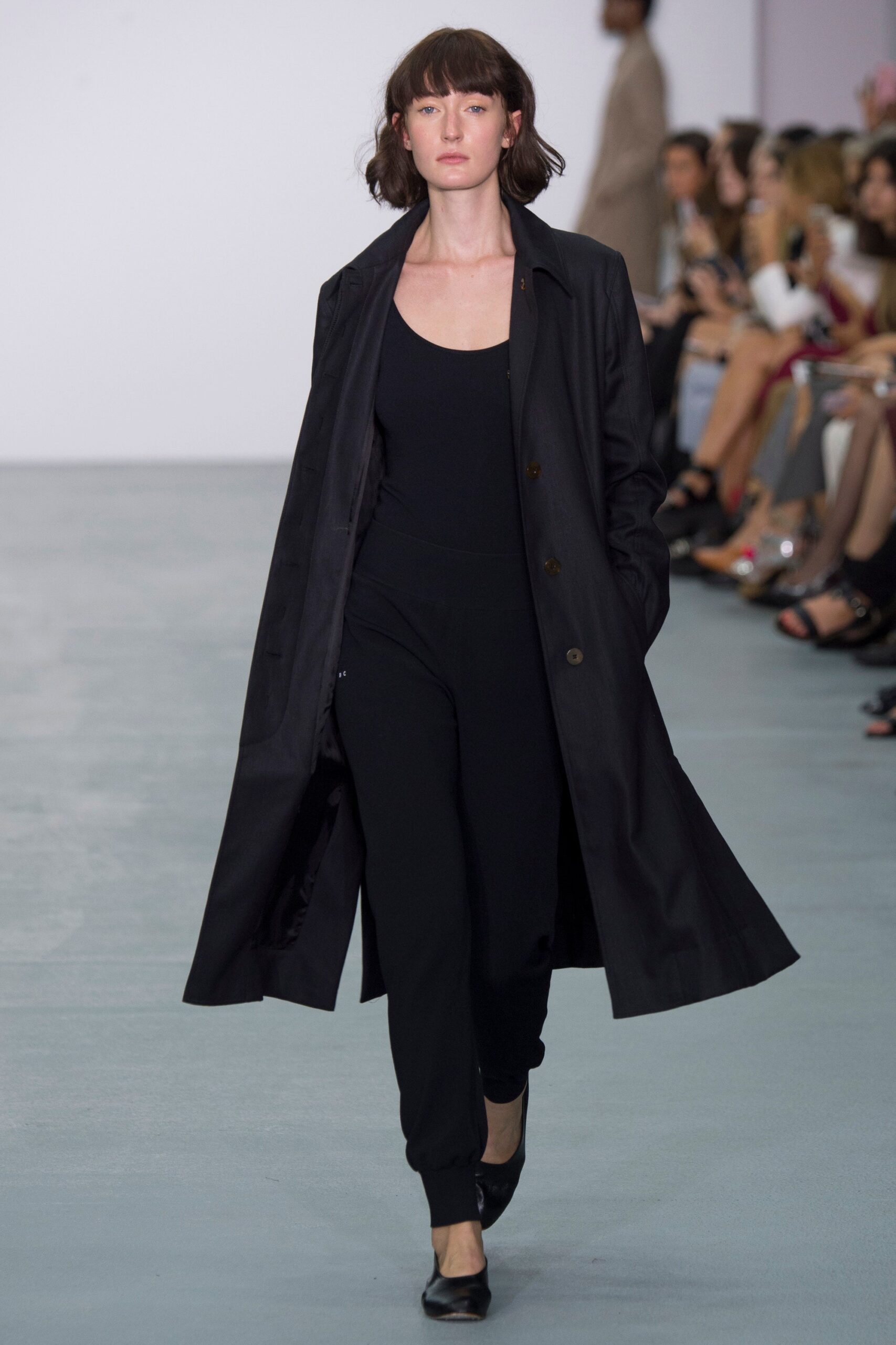 black coat and jumpsuit