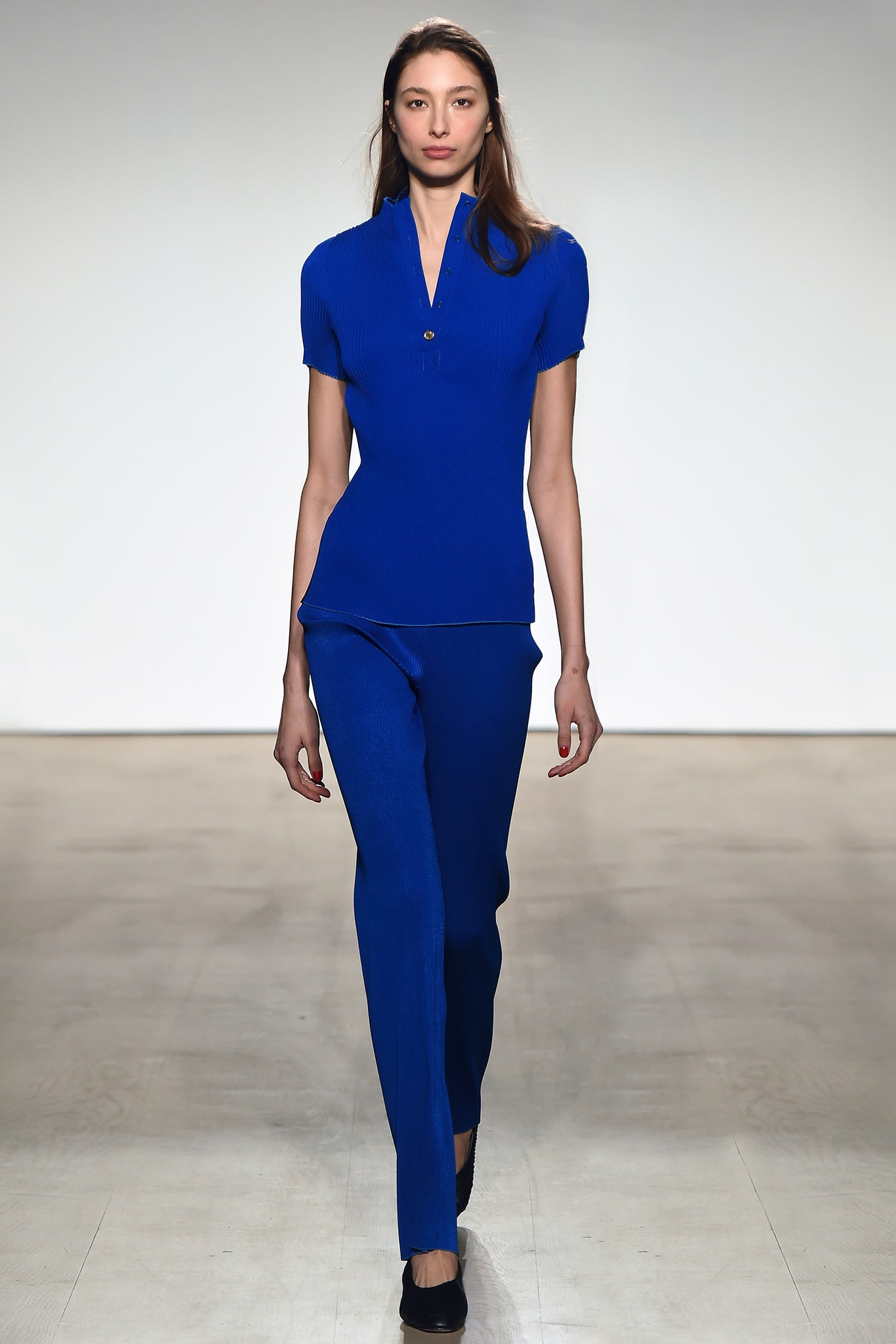 blue fitted top and slim pants