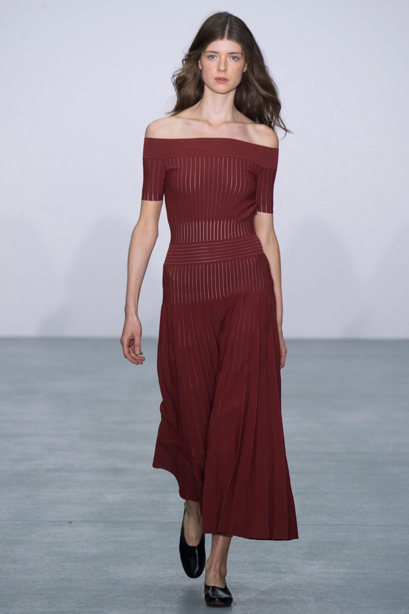 red off-shoulder pleated dress