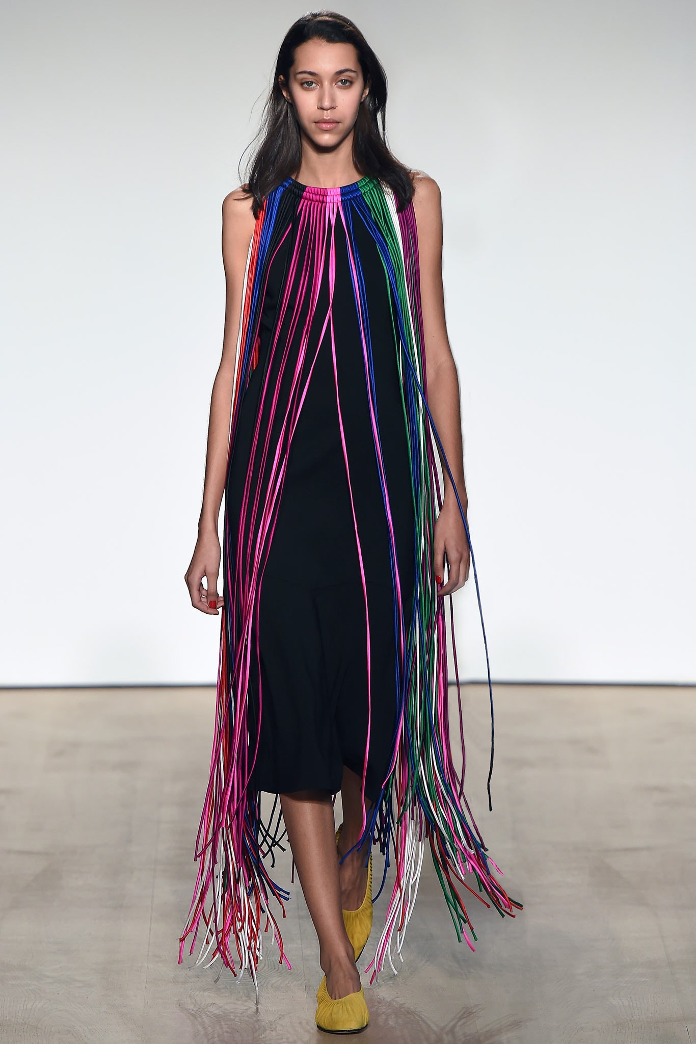 black fringed sleeveless dress