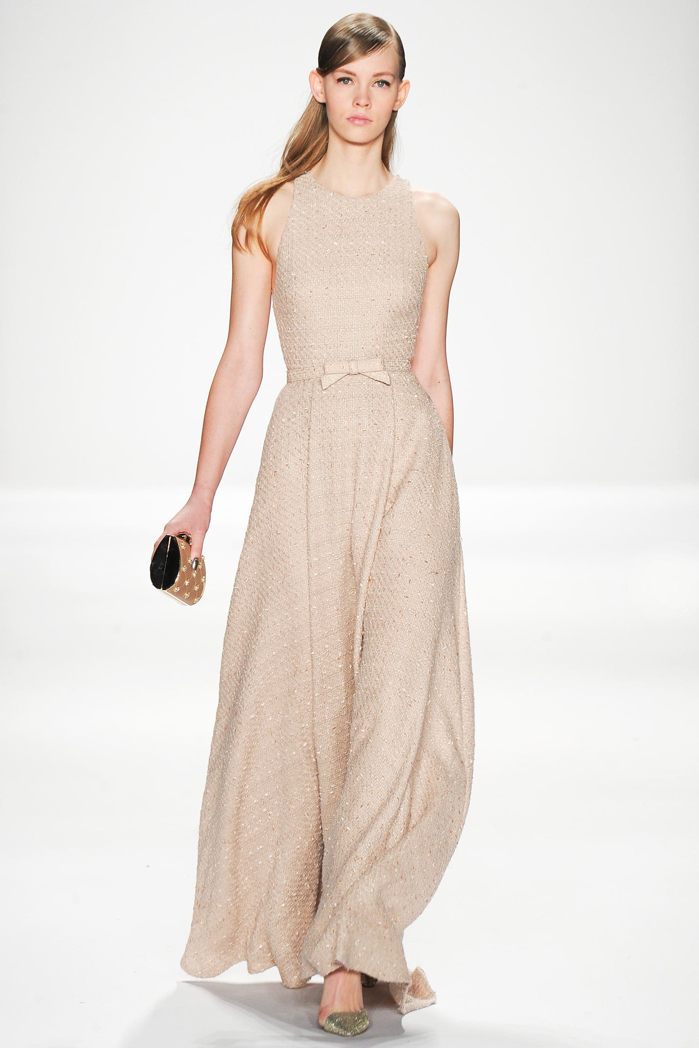 beige silk sleeveless high-neck fitted draped flowing gown