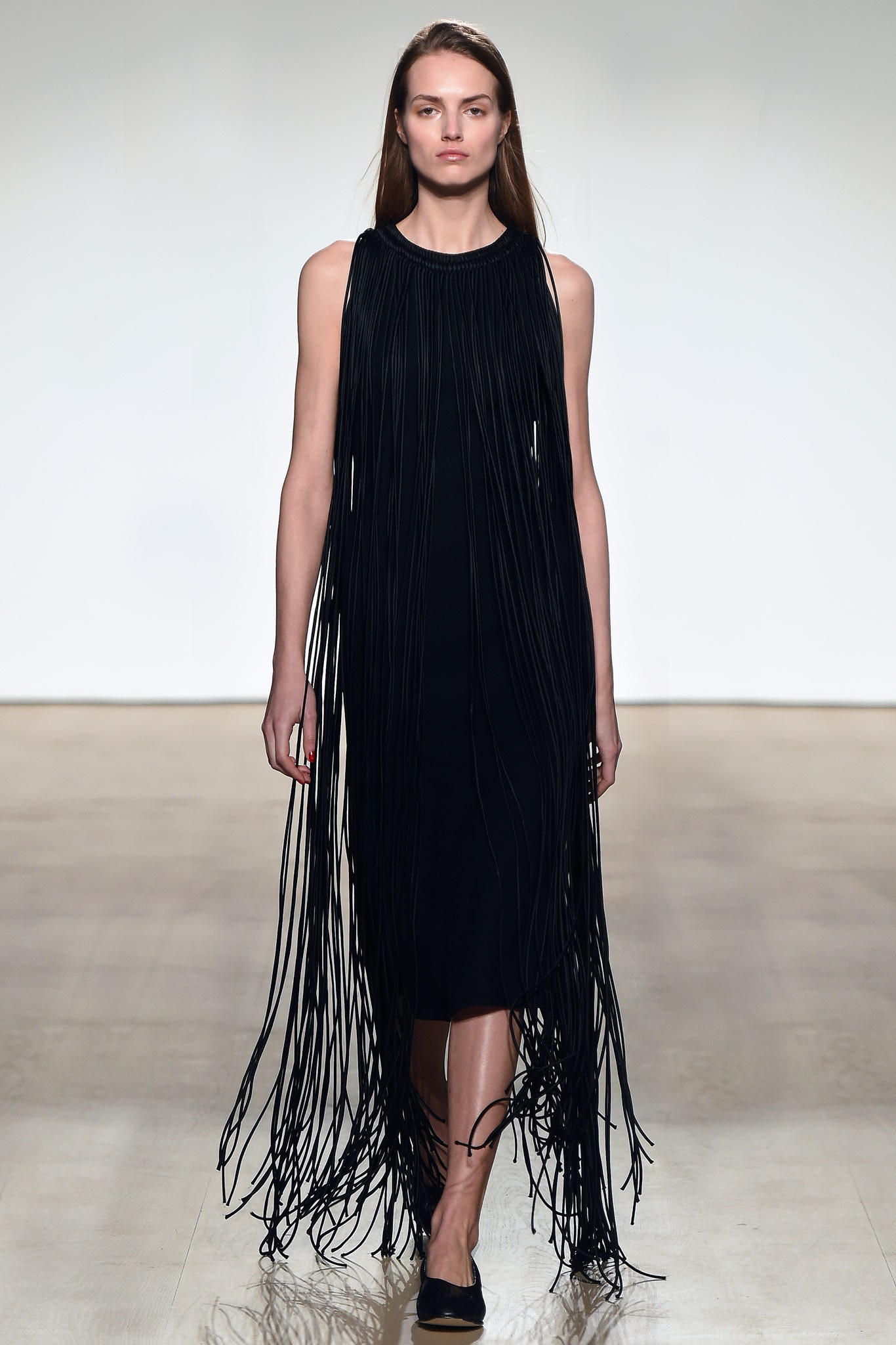 black fringed sleeveless dress