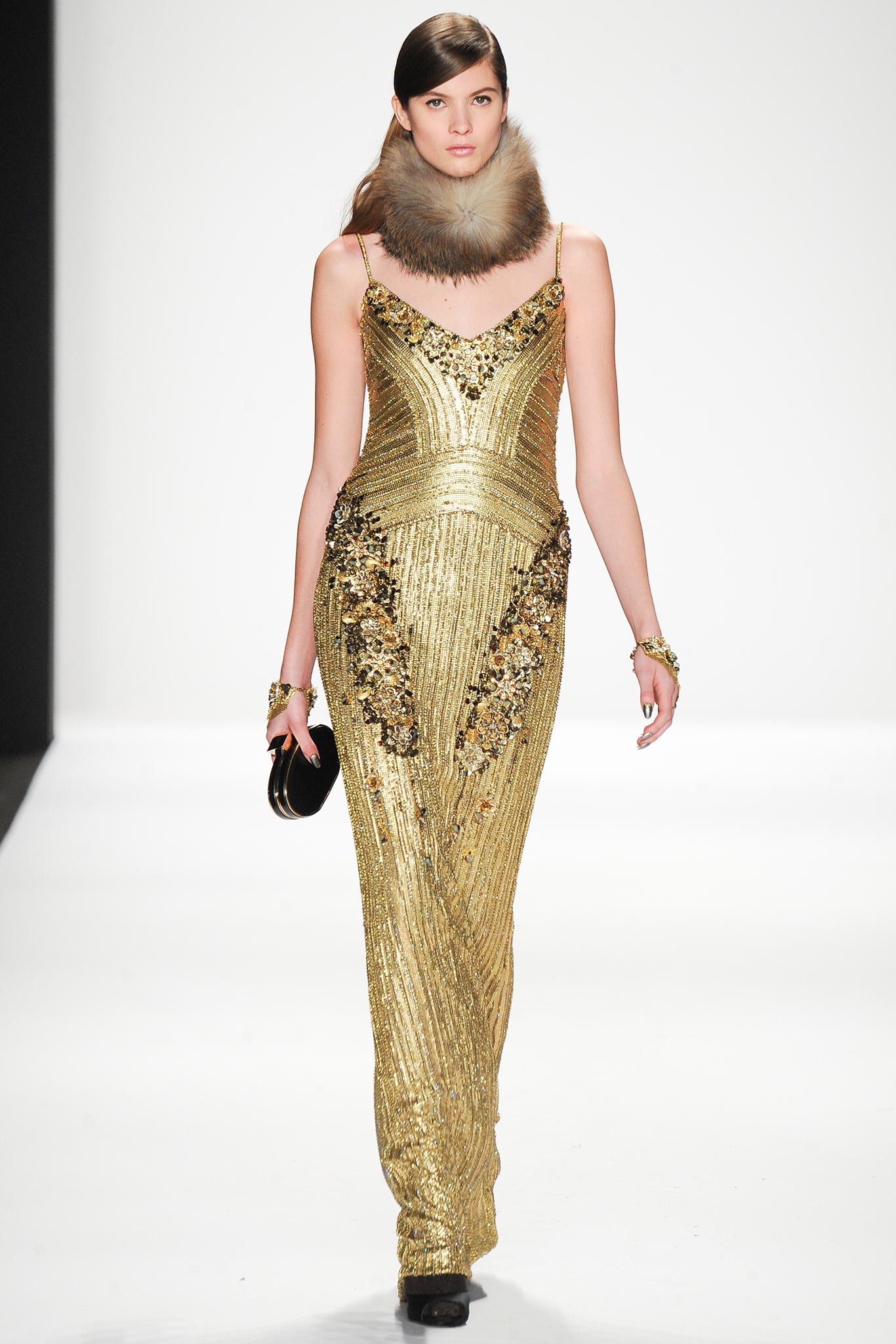 gold sequined gown with fur scarf