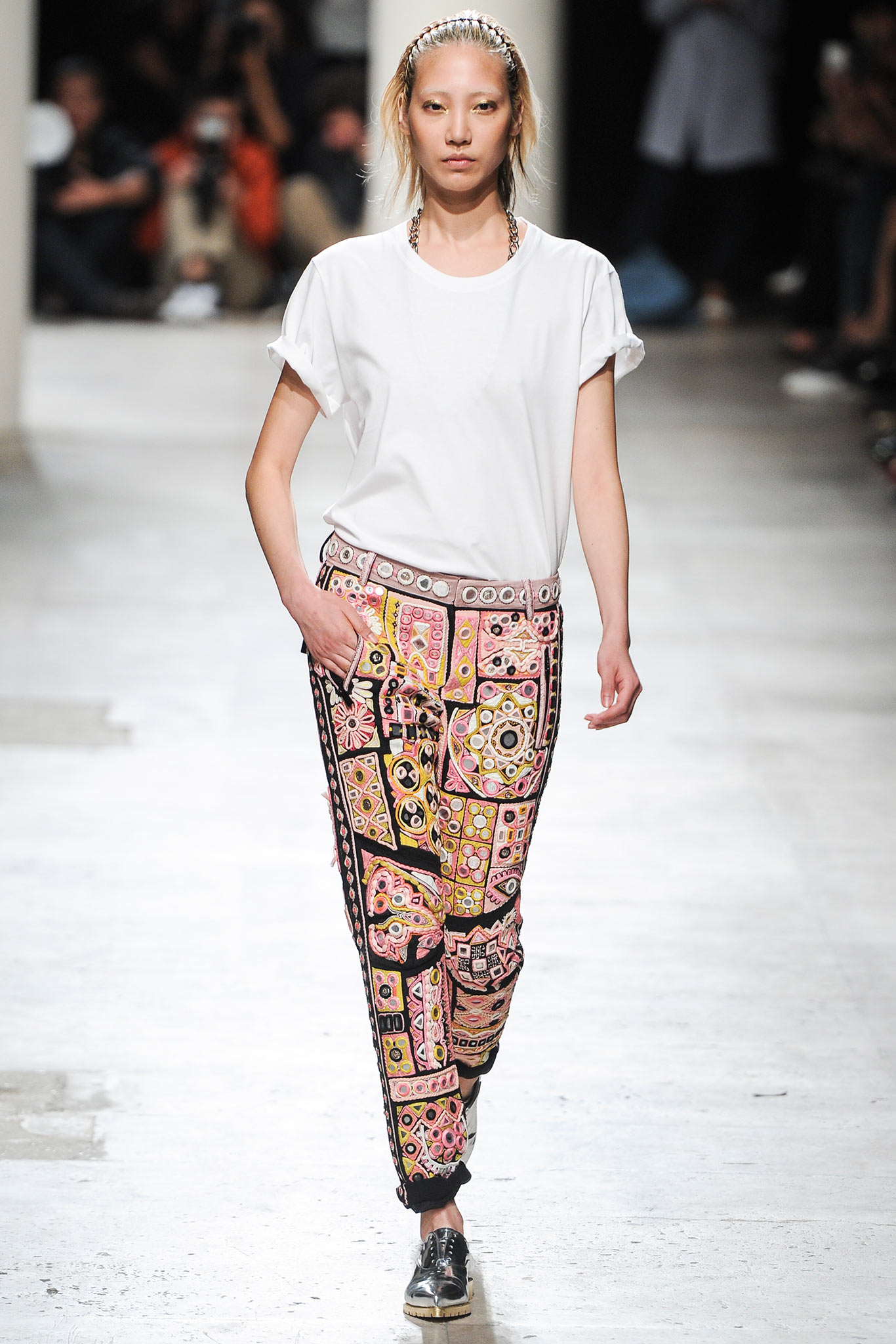 white relaxed top with printed pants