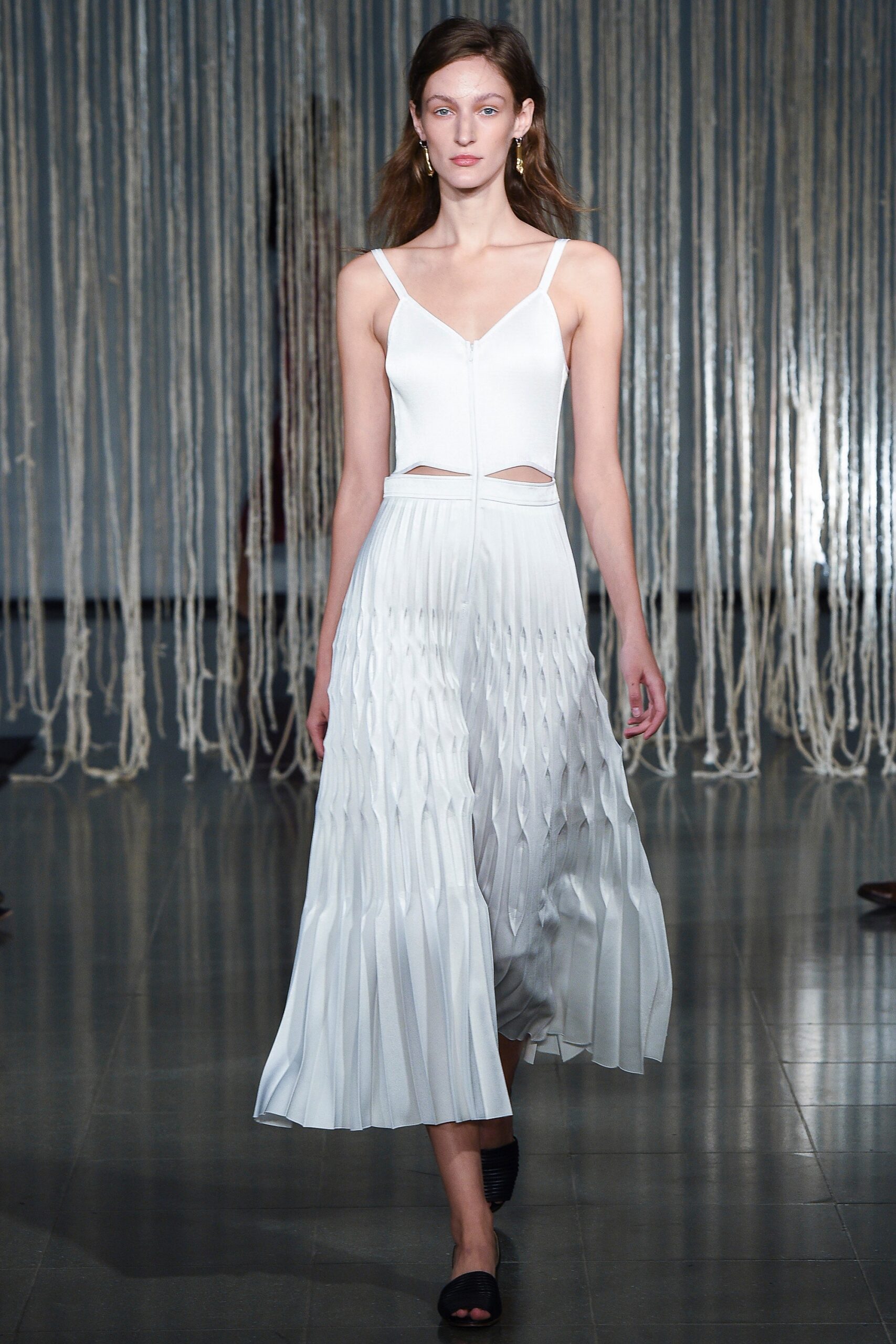 white pleated sleeveless dress
