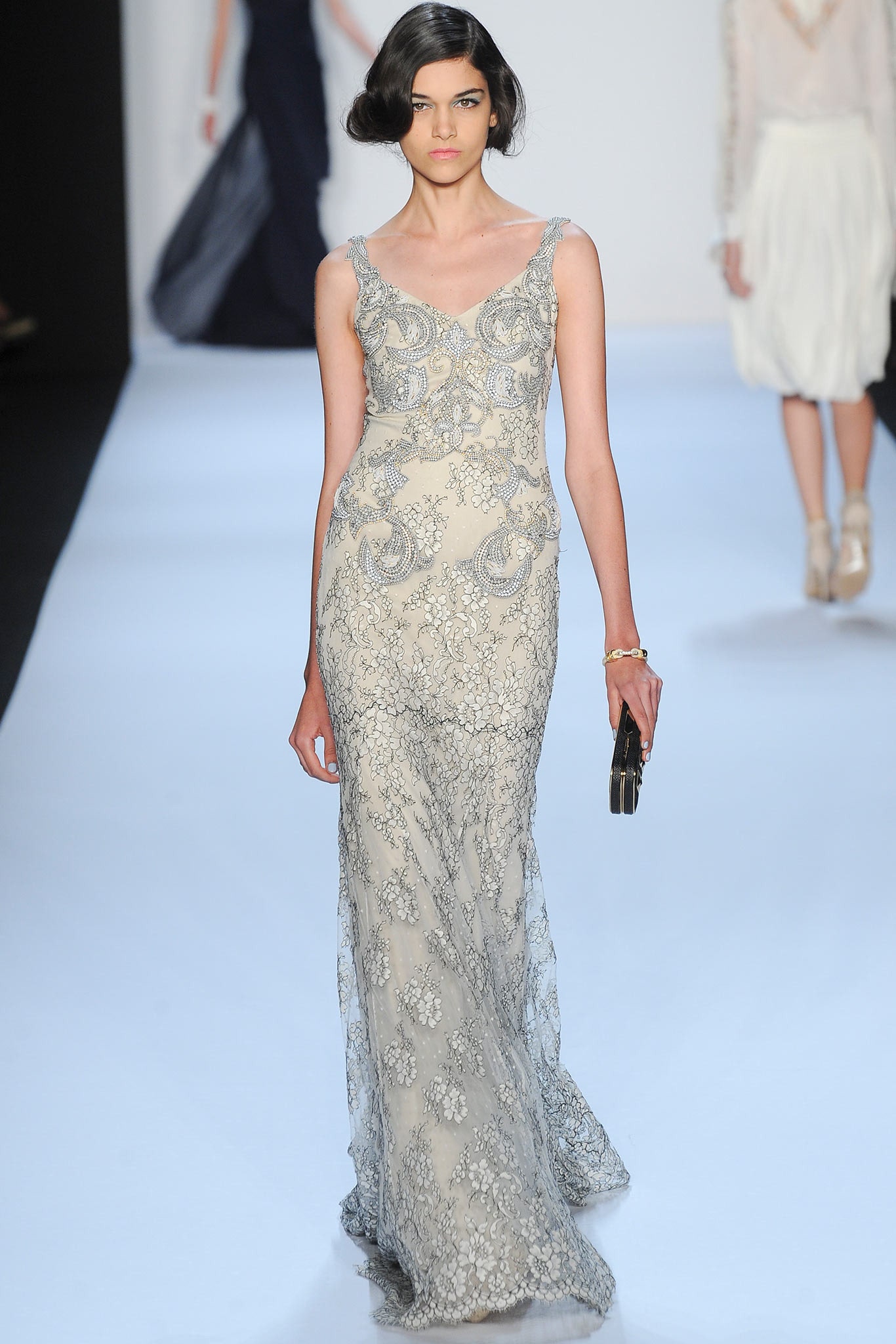 beige embroidered sleeveless gown